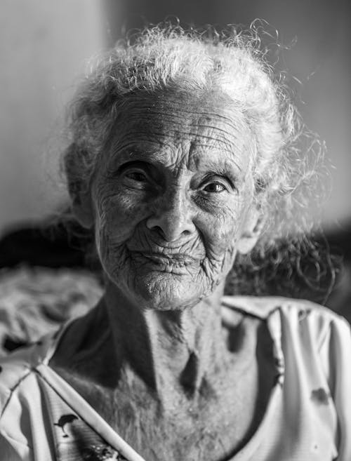 Free Grayscale Photography of an Elderly Woman Stock Photo