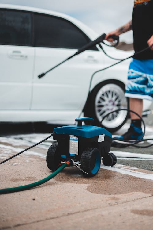 Free Pressure washer placed on sidewalk Stock Photo
