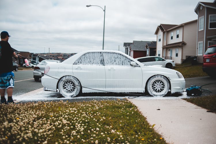 Car Washing With Soap And Pressure Washer