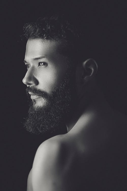 Monochrome Portrait of a Shirtless Man with Facial Hair