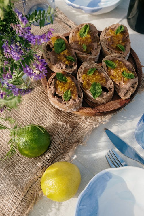 Free Green Round Fruit on Brown Woven Basket Stock Photo