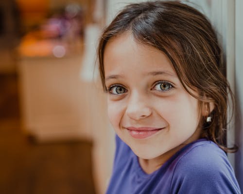 Charming girl smiling at camera