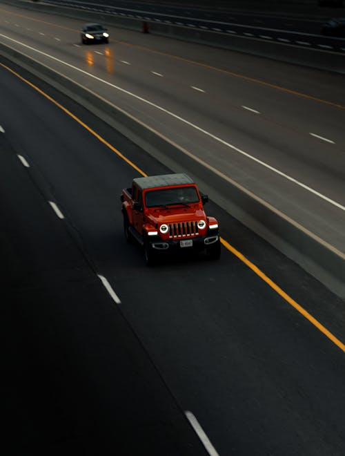 Moving Red Car on the Road