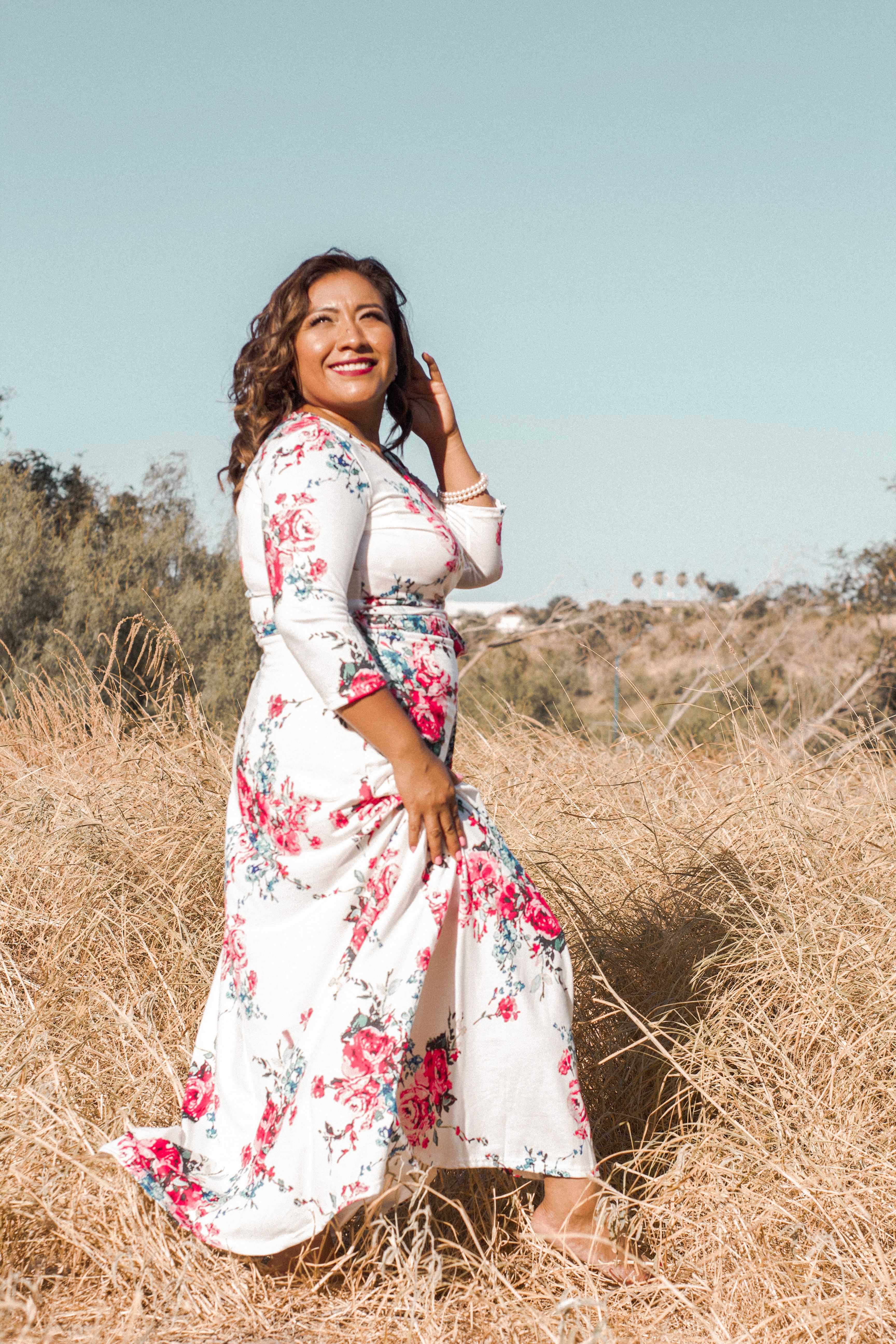 Woman In White Floral Dress Standing On Brown Grass Field · Free Stock ...