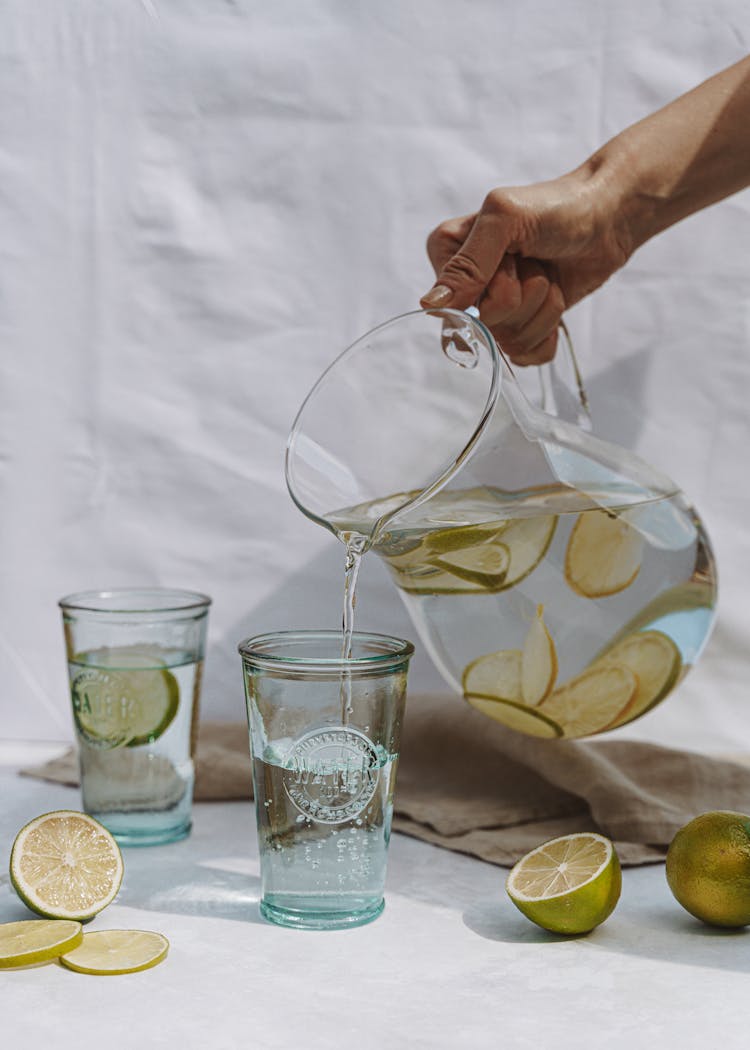 Glass Jug With Water And Lime