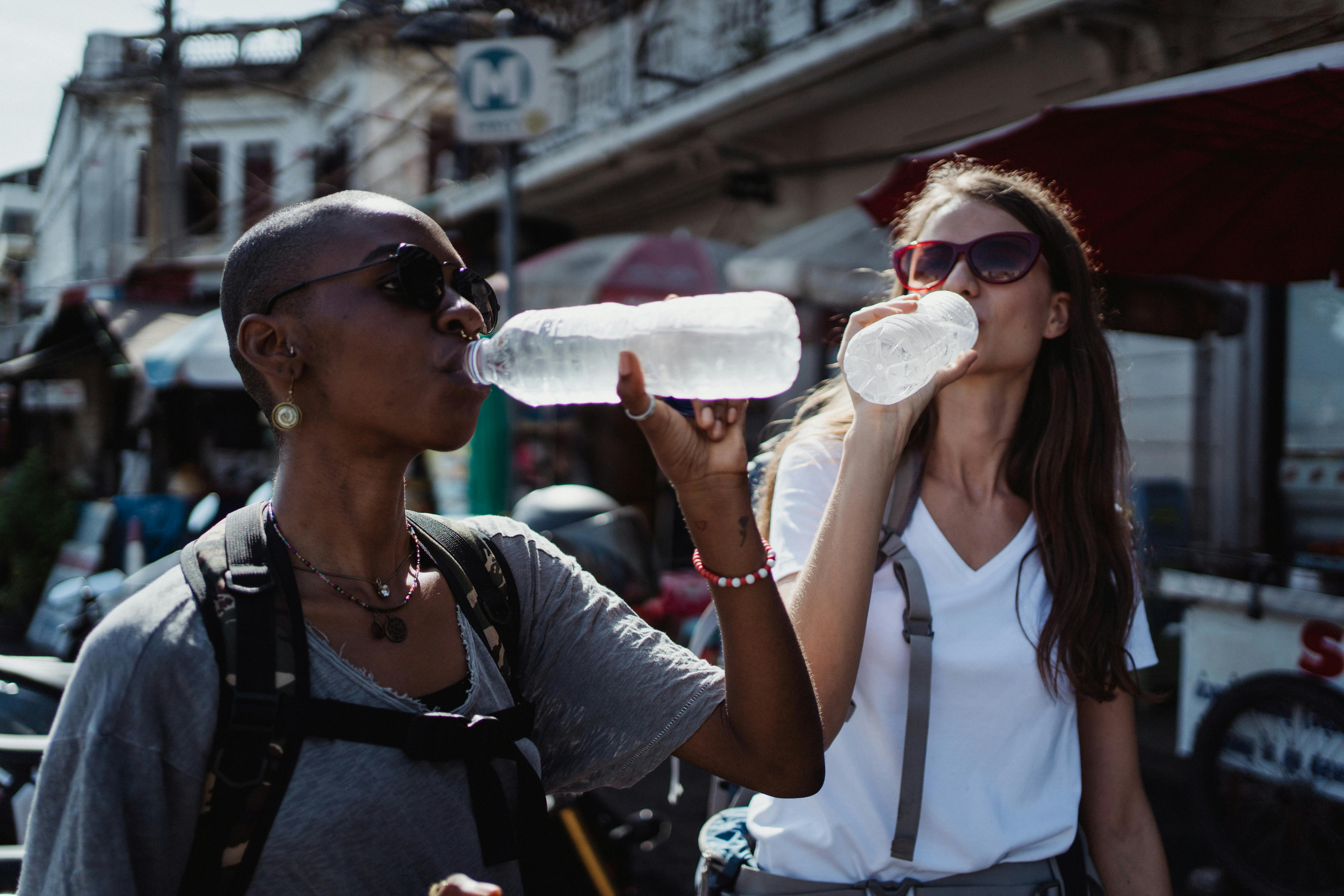 Tourists drinking water