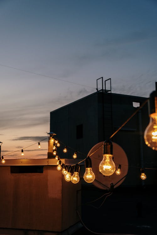 Free White and Yellow String Lights on Roof Stock Photo