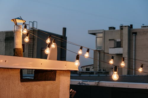 White String Lights on Brown Wooden Post