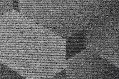 Close-Up Photo of a Gray Abstract Art