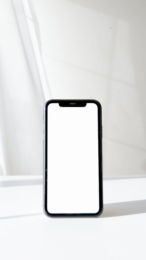 Latest Cellphone in White Screen on a White Surface