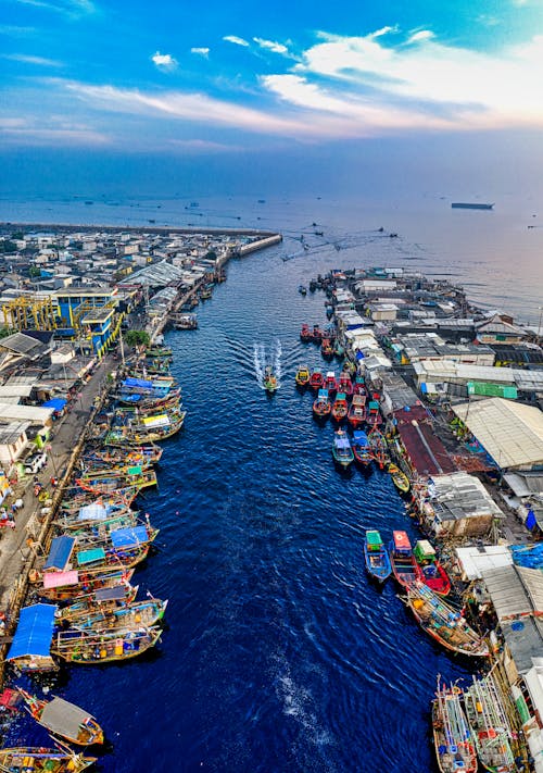 Aerial Photography of Fishing Boats on the Side of the Port