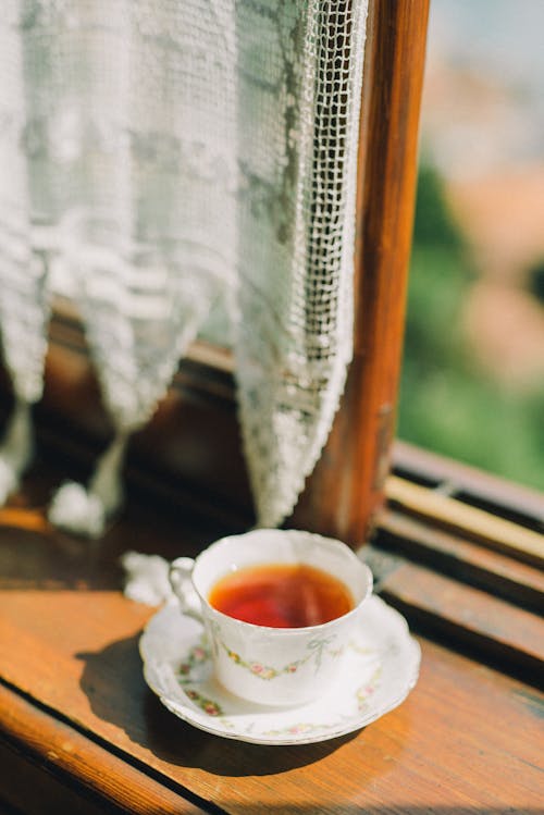 Kostnadsfria Kostnadsfri bild av en kopp te, fat, närbild Stock foto
