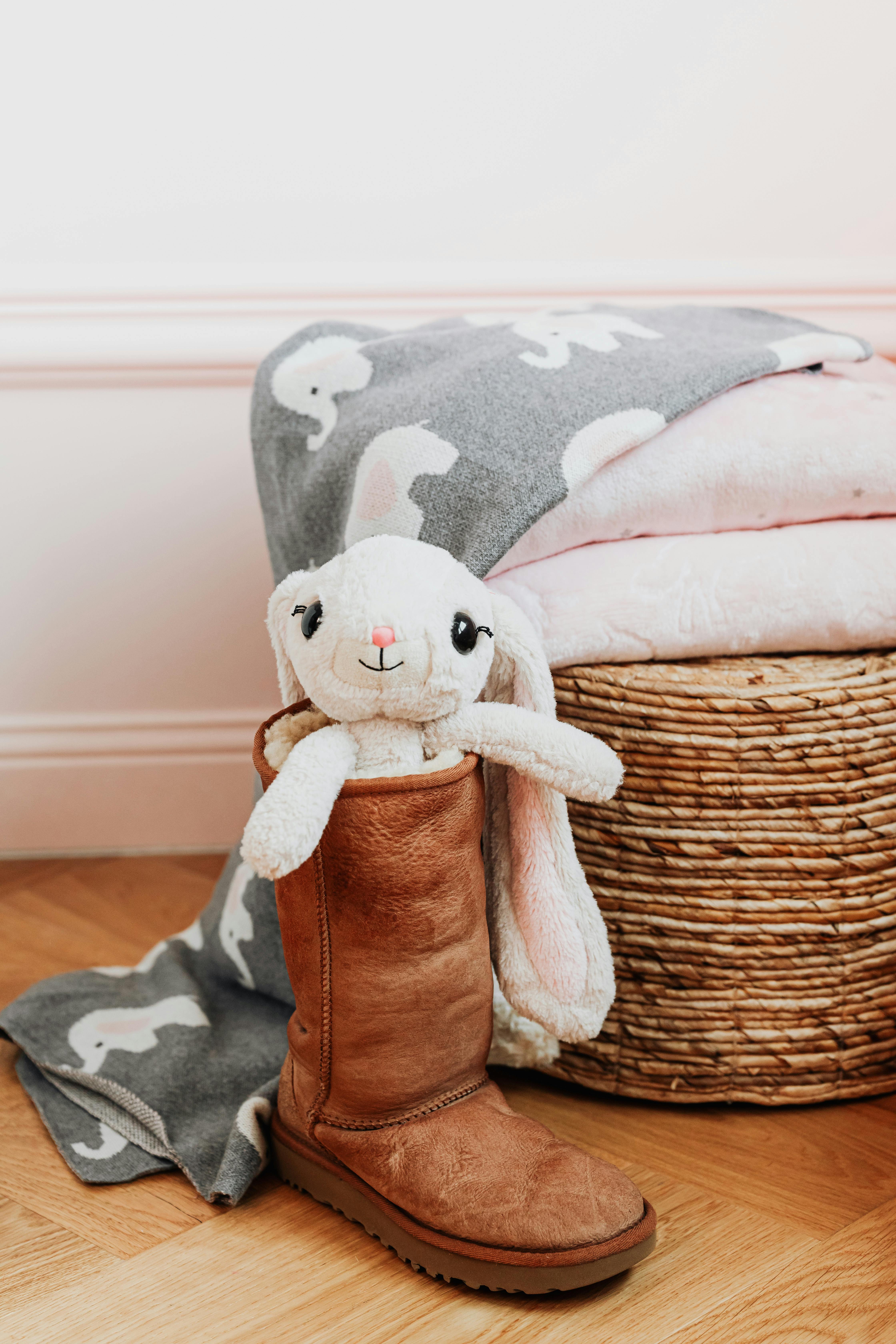 a bunny rabbit stuffed toy in a boot