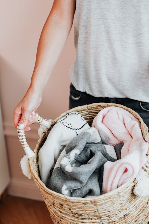 Free Holding a Basket with Blankets Stock Photo