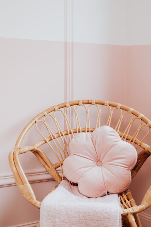 Pink Pillow on a Rattan Chair