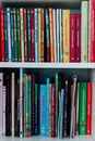 Books on White Wooden Shelf