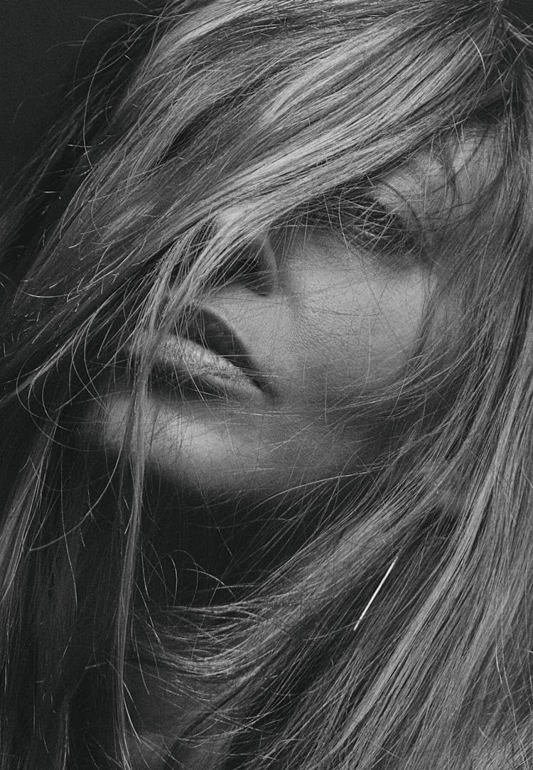 Grayscale Photo Of Woman With Messy Hair