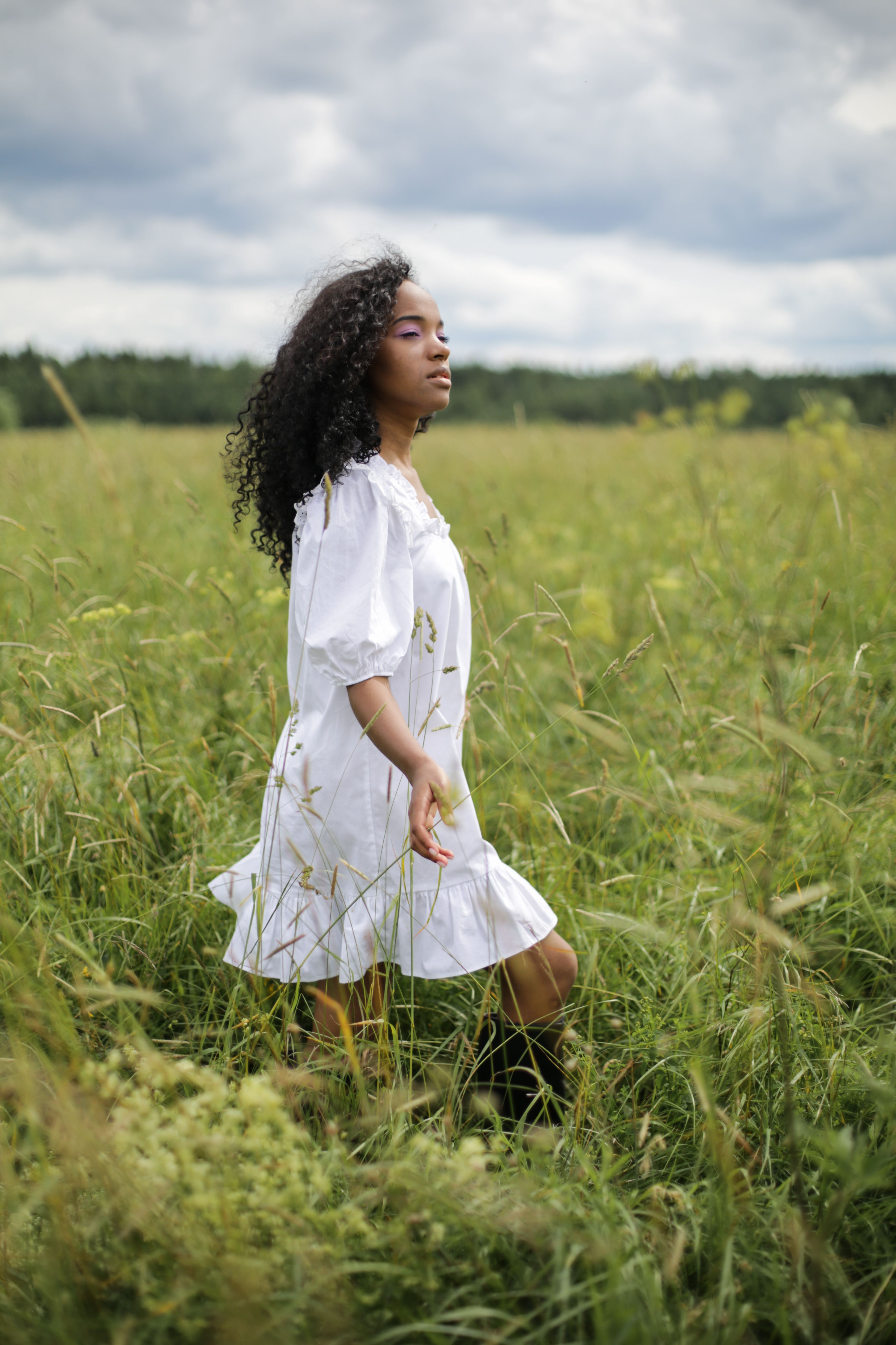 Girl in White Dress Standing on Green Grass Field · Free Stock Photo
