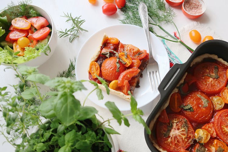 A Delicious Tomato Pie On White Plate