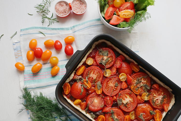 Top View Of Baked Tomatoes On A Tray 