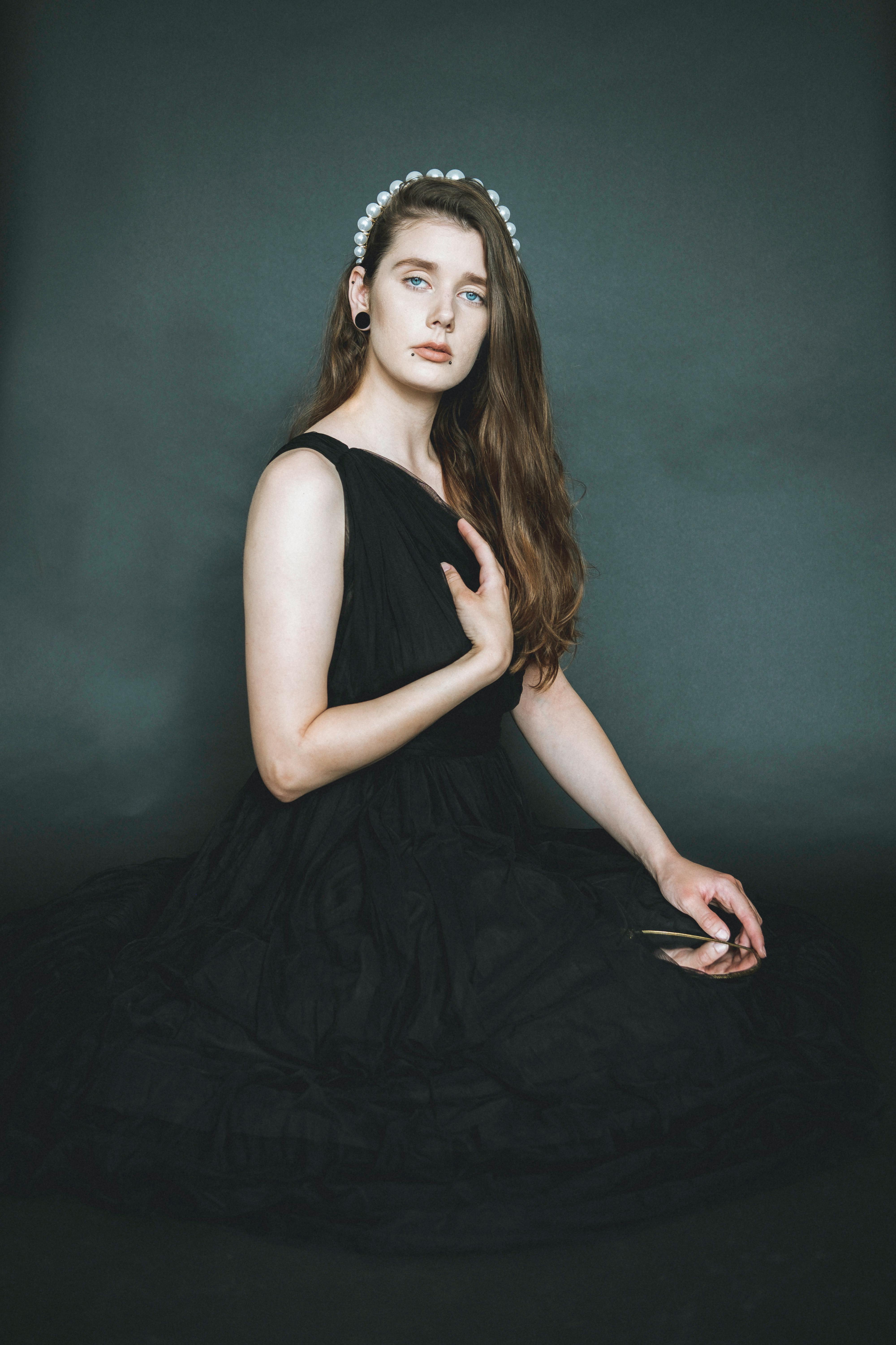 the woman in black dress