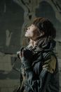 Woman in Black Leather Jacket Holding Black Dslr Camera