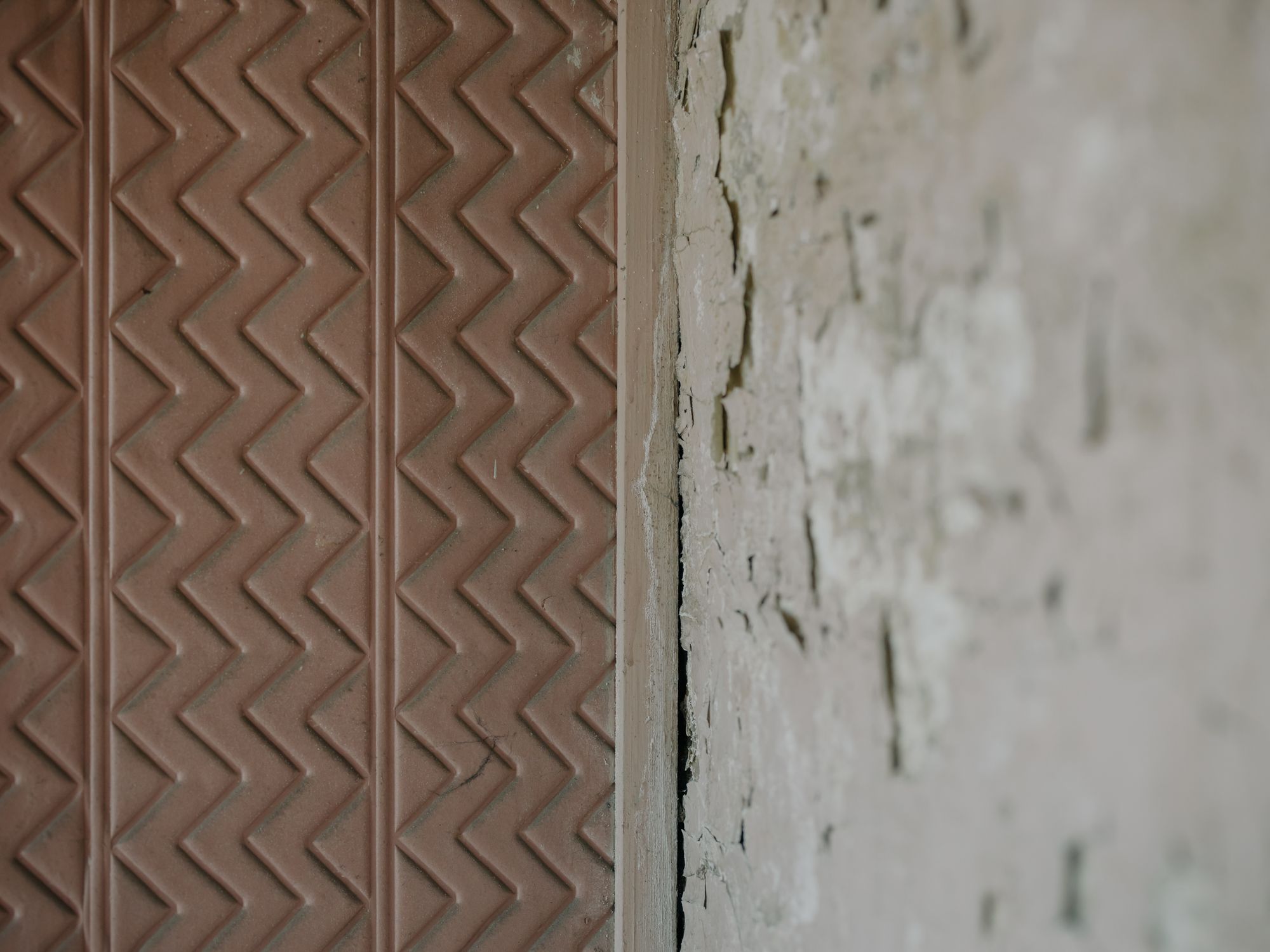 Wallpapering in Petersham, Richmond upon Thames — decorator hanging pattern-matched wallpaper