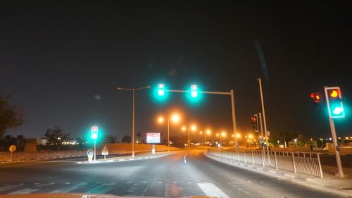Free stock photo of empty road, green light, qatar Stock Photo