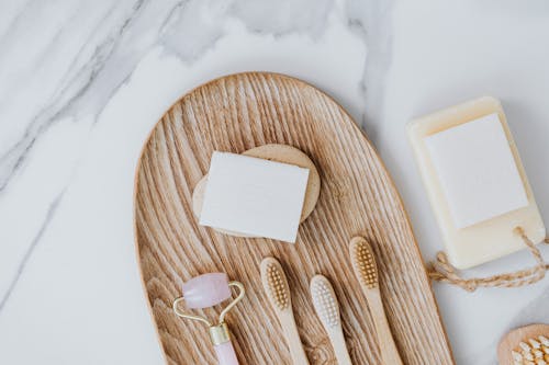 Free Wooden Toothbrush on a Tray Stock Photo