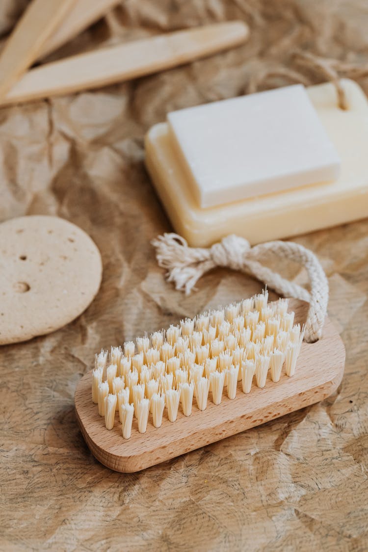 Close-up Of A Brush And Cleaning Materials