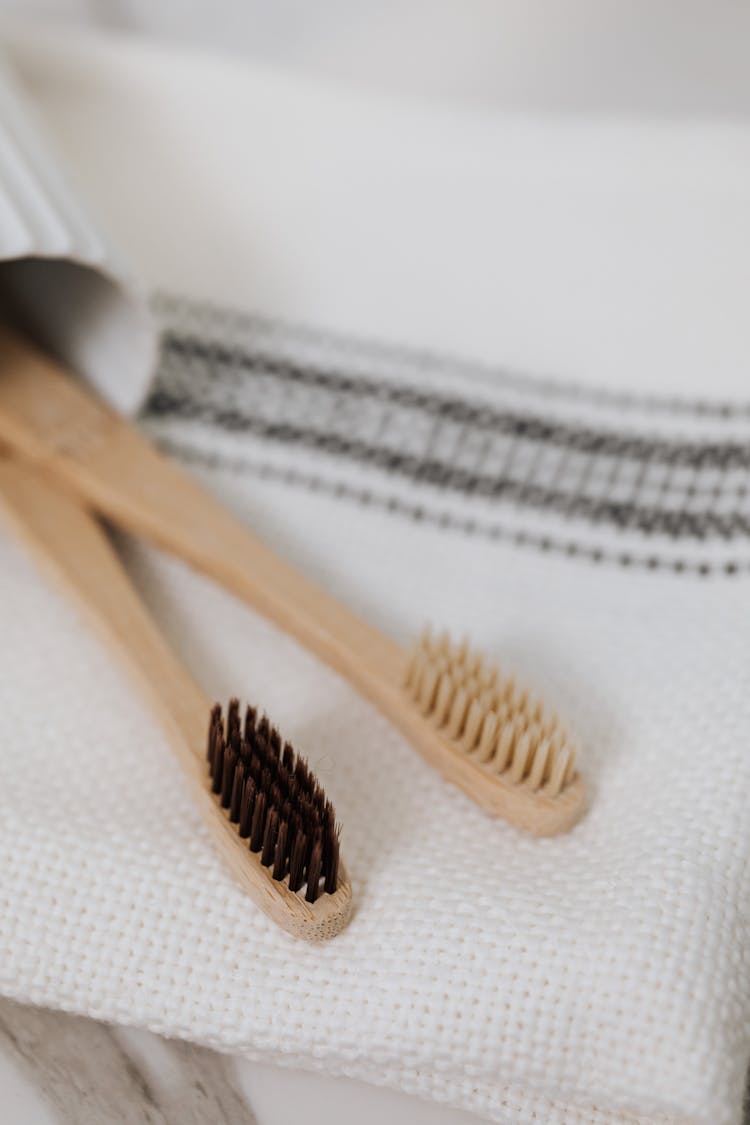 Wooden Toothbrush On White Cloth