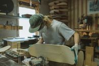 A Man Making a Skateboard