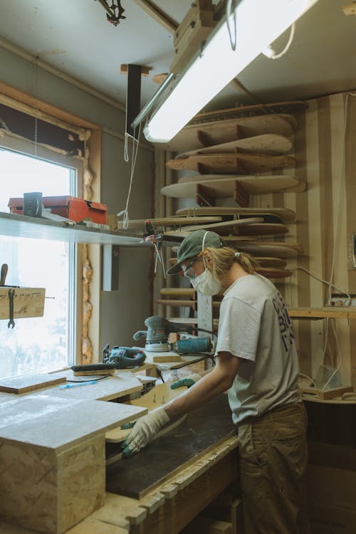 A Man Making a Skateboard