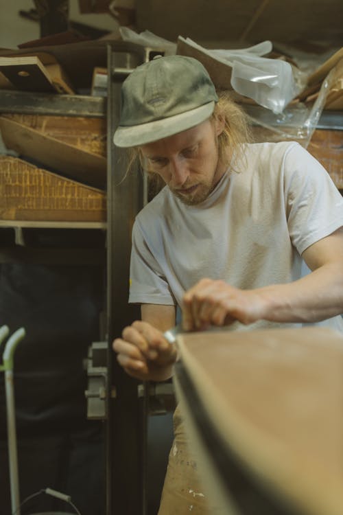 A Man Making a Skateboard