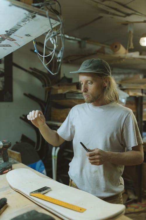 A Man Making a Skateboard