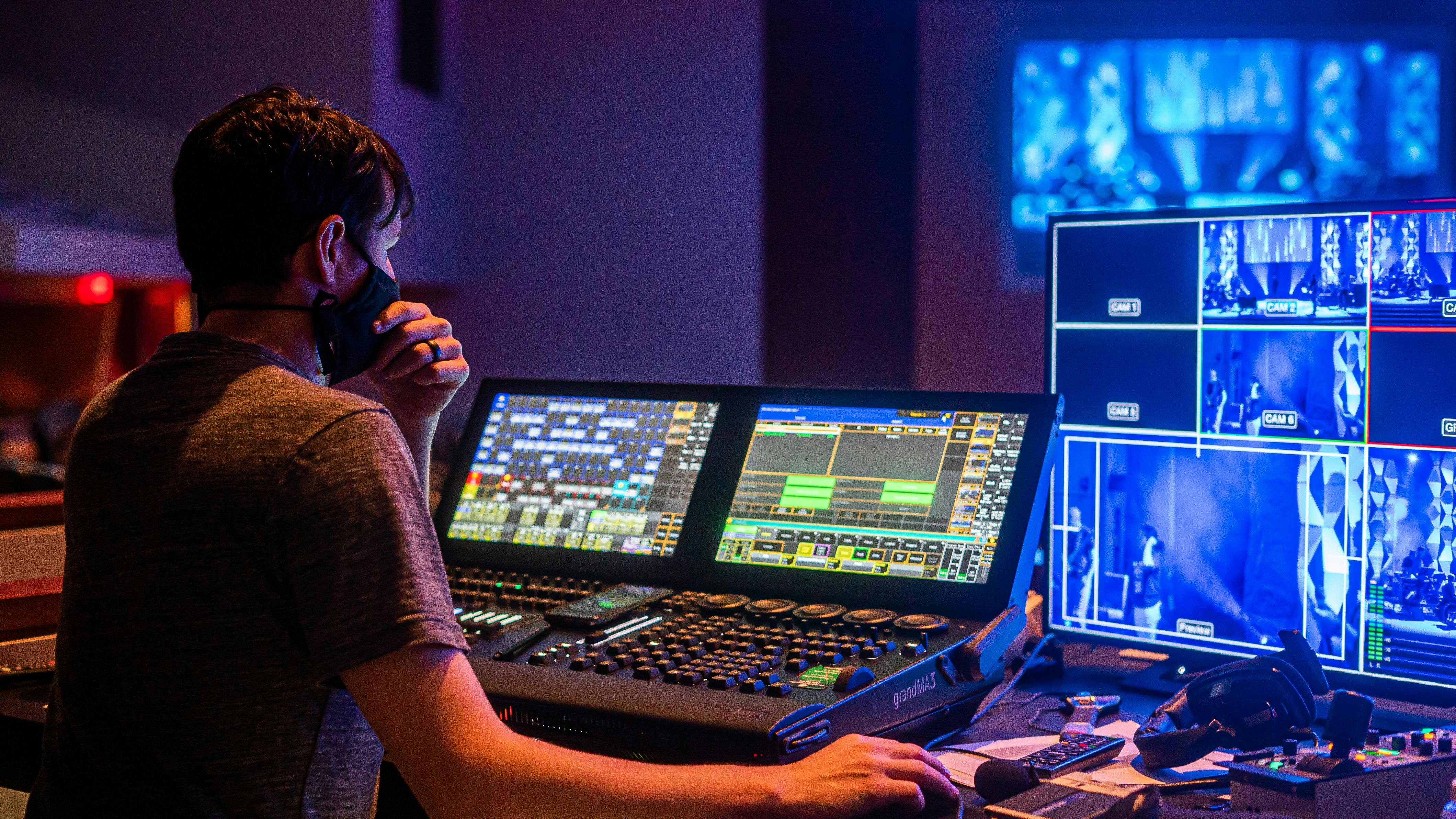 technical director in mask during show