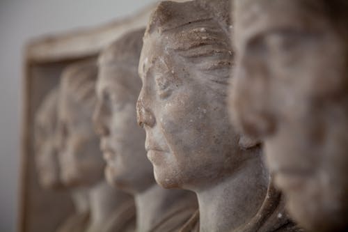 Close-up Photo of Statues