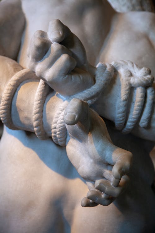 Free Close-up Photo of Statue's Tied Hands Stock Photo