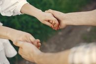 Close-up of Couple Holding Hands