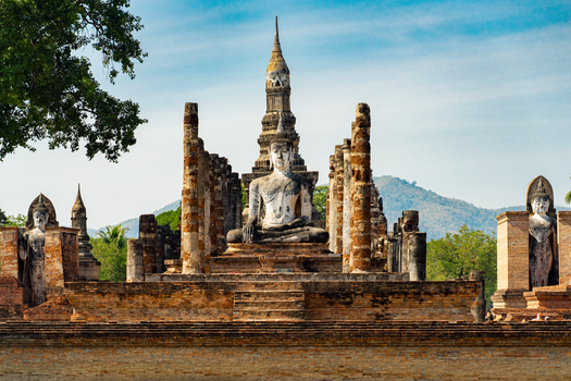 Explore the ancient ruins of Wat Mahathat temple in Sukhothai, a UNESCO World Heritage site in Thailand.