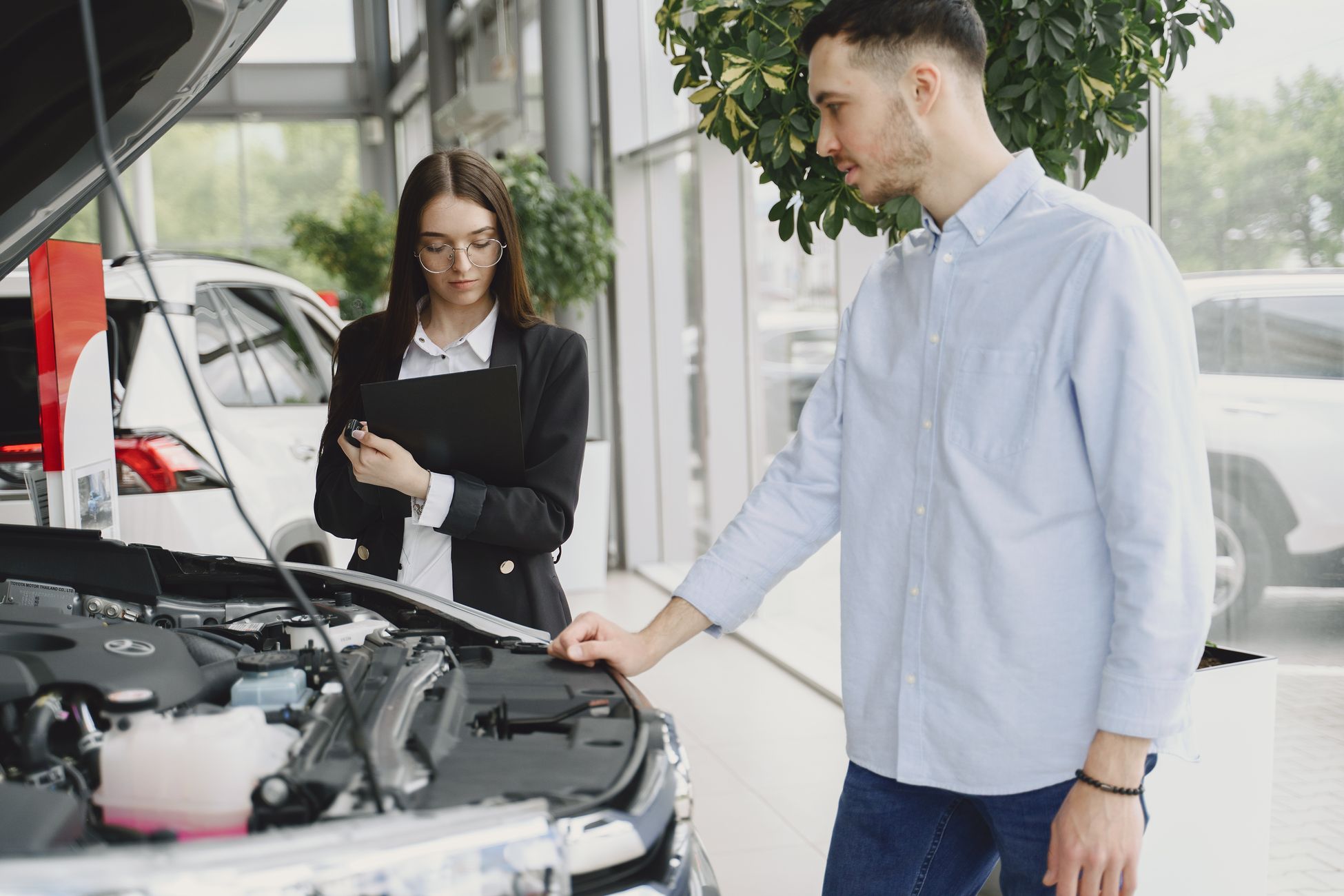 Service advisor reviewing an inspection with a customer