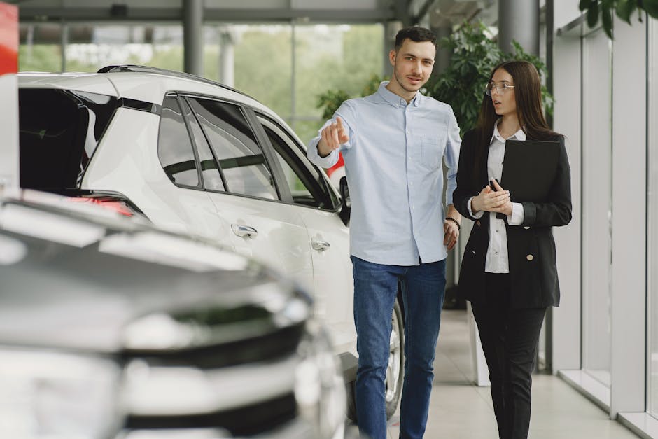 service advisor discussing diagnostic results with customer - Porsche diagnostic services