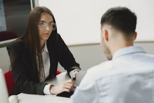 Woman and Man in Office