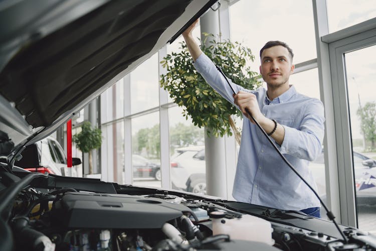 Man Checking Car Engine