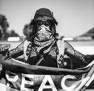 Free stock photo of city art, demonstration, holding sign