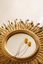 Dried Craspedia Flowers on a Mirror