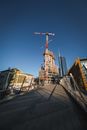 Footpath leading to building construction in modern city