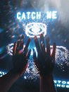Persons Hand on Glass With Blue Light