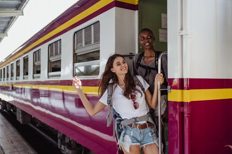 Women Leaving Train Car