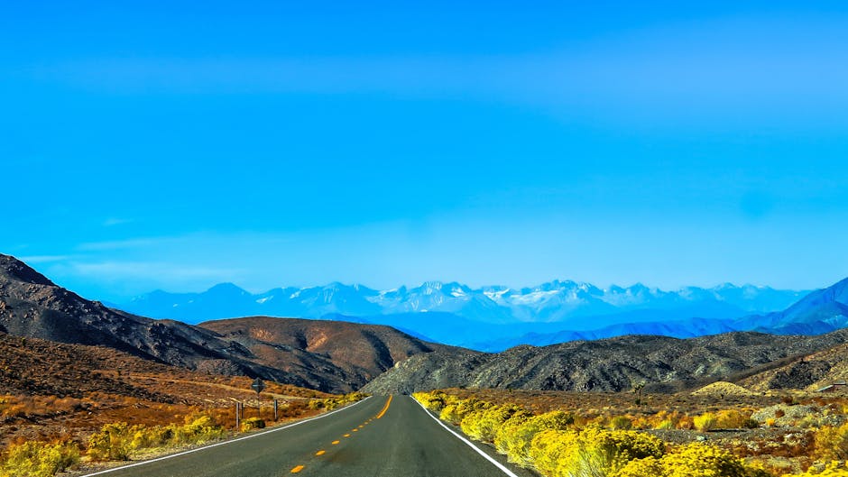 Road Heading Towards Mountain